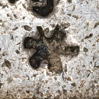 Probably 米 - mǐ - rice, meter