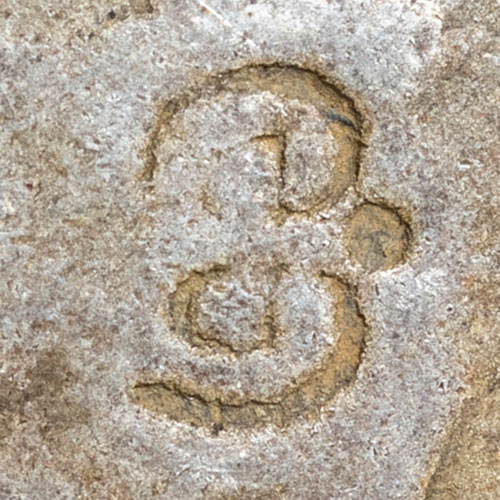 ᢙᠪ - likely Mongolian (unread) - Likely Mongolian, judging by the top letter's form: a Todo Ali Gali zha over ba. Probably a single glyph or monogram; reading and meaning not identified.