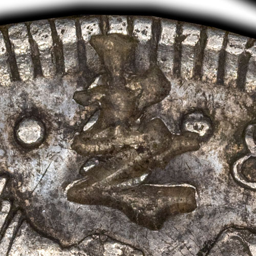 Possibly 㐊 - (Cantonese) si6 - no recorded meaning