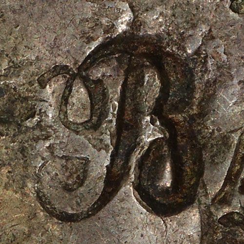 A cursive or monogram B - Latin-letter chopmark - The cursive, running-hand form of 及 (jí, 'to reach, to extend to; and') can curl into a shape resembling a Latin B, so a mark read as B might be a brush-written 及.