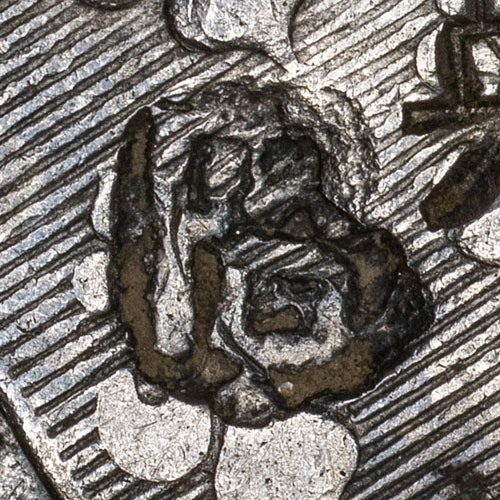 Unknown partial chopmark, possibly 䄑. What's interesting about this mark, is it appears a corner of the punch tool has broken off.
