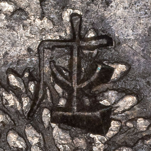 Probably a caligraphy or Liushutong version of 庄 - zhuāng - village, manor