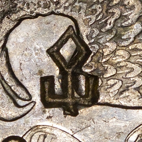 Possibly 旵 or 仚 or 屳
