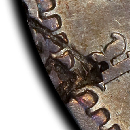 Partial chopmark on the edge of reverse