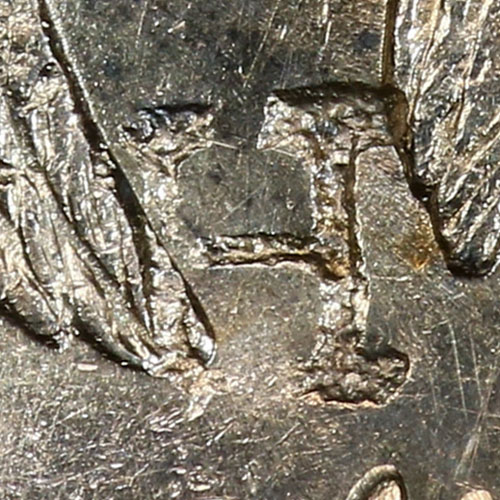 H - Latin-letter chopmark - A single Latin letter used as a chopmark. On foreign trade coins a Latin initial is most often the private mark of a Western merchant, assayer, or trading house that handled the coin, recording who tested or accepted it much as a Chinese shroff's name-stamp did. The specific person or business behind an individual letter is generally not identifiable, and the same letter could belong to different marks in different ports.