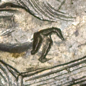 Unknown, partial chopmark