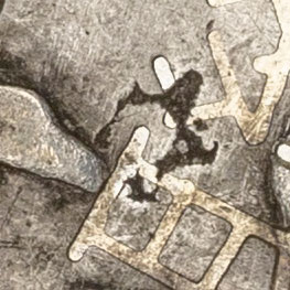Small sun shaped symbol chopmark